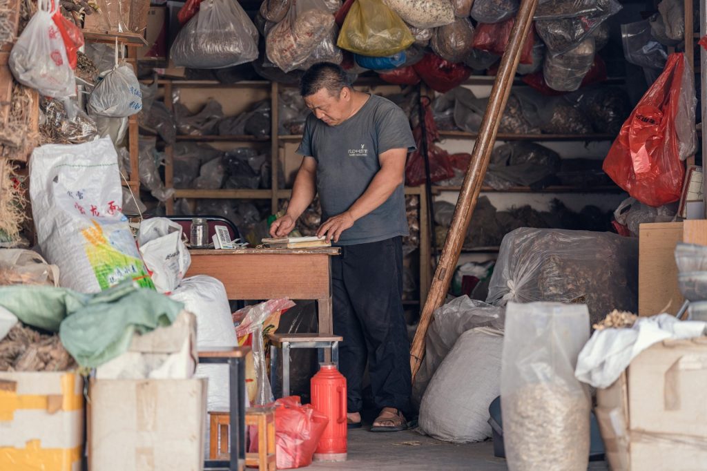 Dragon Boat Festival Tea preparation - Ye Jinping in his workshop.